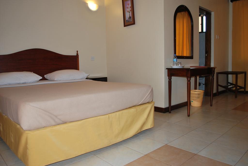 Parkview Inn Moshi Habitación foto