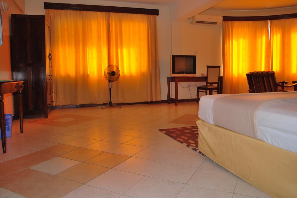 Parkview Inn Moshi Habitación foto