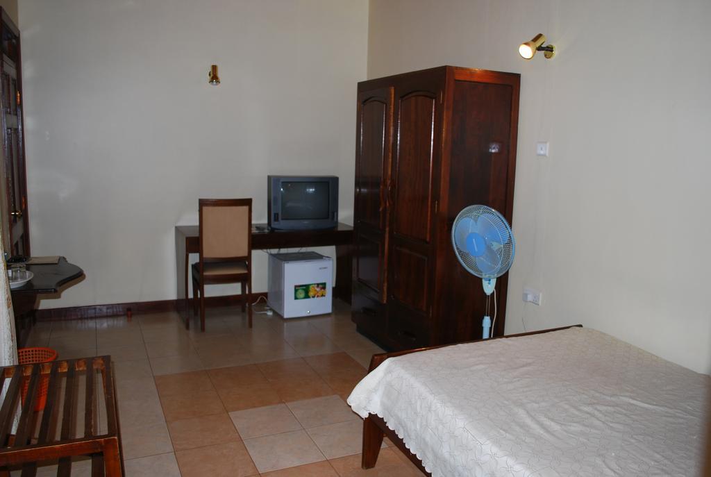 Parkview Inn Moshi Habitación foto